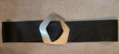 Black leather belt with a gold buckle 