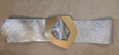 Metallic leather belt with a hexagonal design buckle